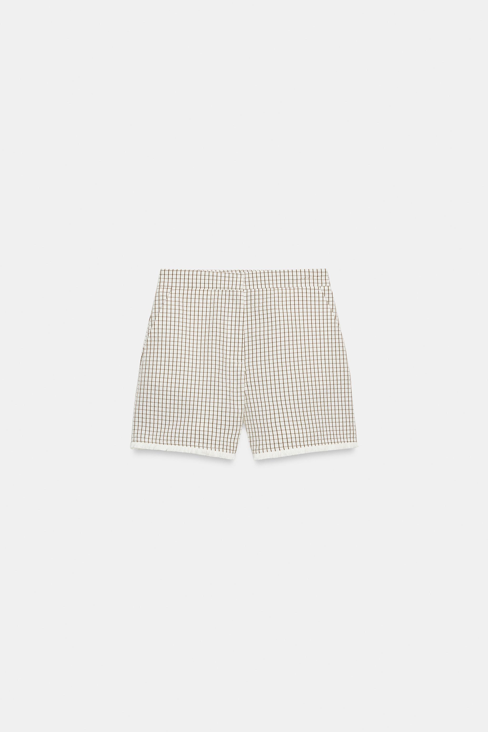 SHORT À CARREAUX EFFRANGÉ